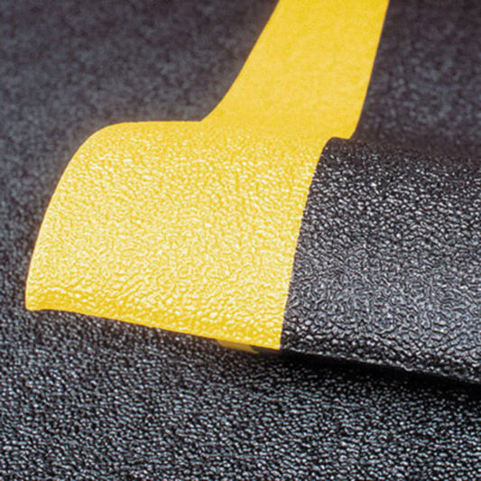 Superior Manufacturing 3' X 60' Black With Yellow Edge Dyna-Shield® PVC Sponge NoTrax® Pebble Step Sof-Tred™ Anti-Fatigue Floor Mat